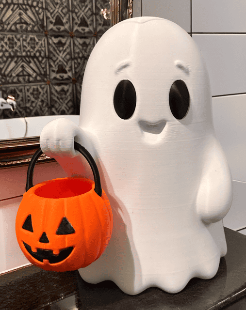 3D printed ghost with pumpkin bucket for Halloween decor. Acadiana3DPrints