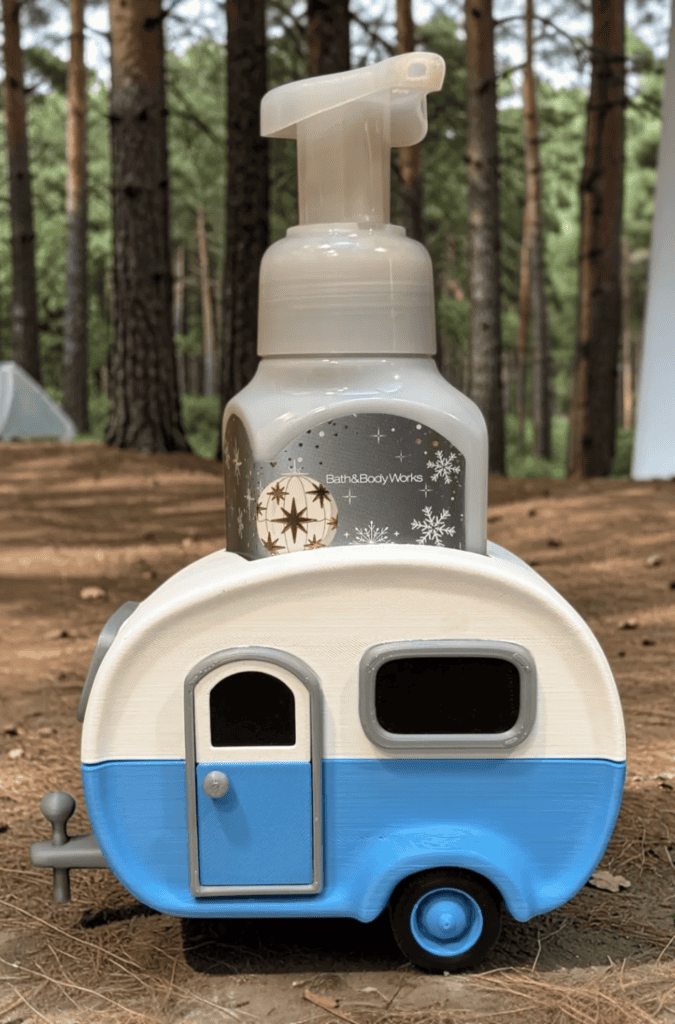 Hand sanitizer dispenser shaped like a camper trailer for kids. Acadiana3DPrints