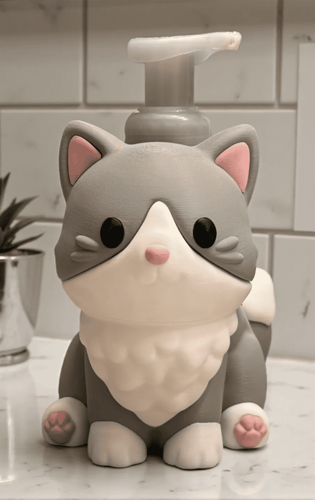 Cute 3D printed cat soap dispenser with pink paws and black eyes. Acadiana3DPrints