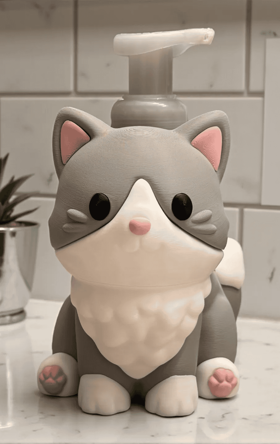 Cute 3D printed cat soap dispenser with pink paws and black eyes. Acadiana3DPrints
