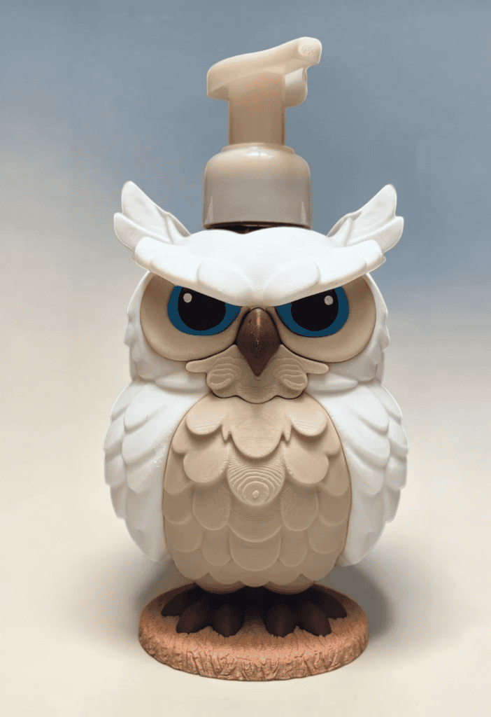3D printed owl soap dispenser with detailed feathers and expressive eyes. Acadiana3DPrints