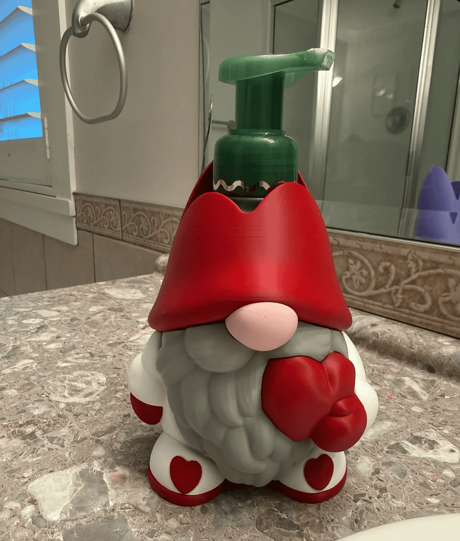 Valentine gnome soap dispenser with heart details for Valentine's Day. Acadiana3DPrints